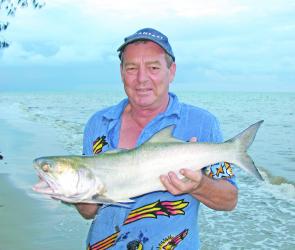 Mick Heffernan with a blue salmon caught off Four Mile Beach.